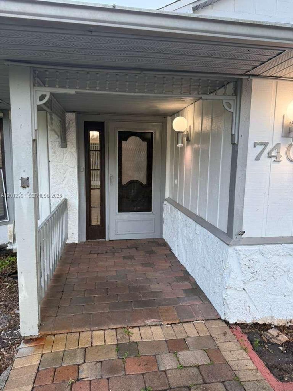 Photo of 7403 Winter Garden Pkwy, Fort Pierce, FL 34951 (MLS # A12012901)