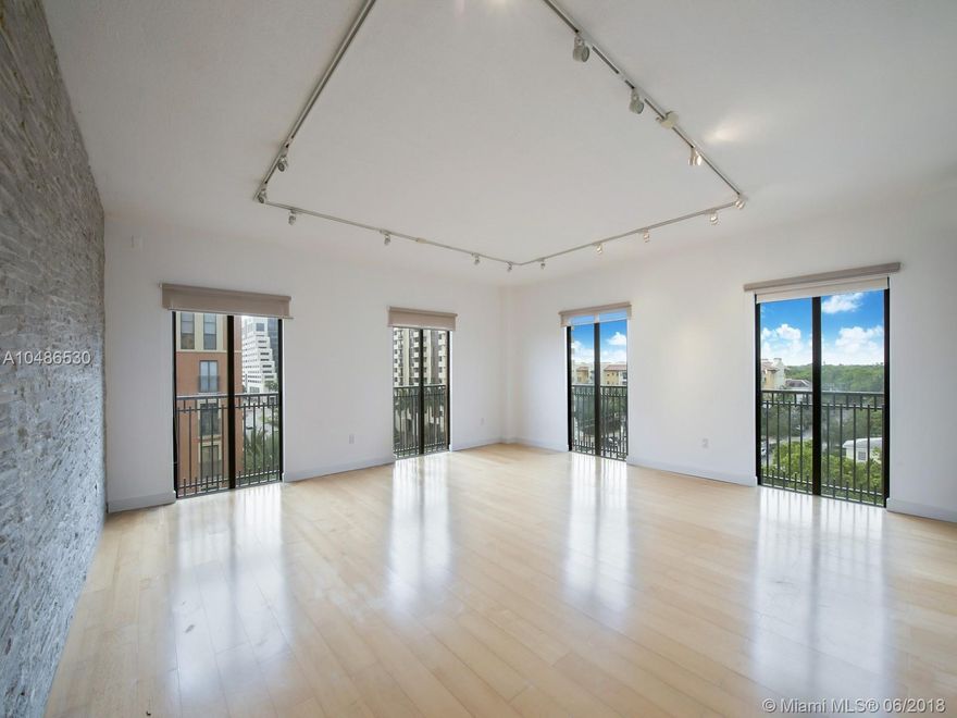 Spacious 2 bedroom, 2.5 bathroom unit in boutique Coral Gables building of only 17 units. Beautifully upgraded featuring wood floors throughout, amazing kitchen with stainless steel appliances and marble baths. High ceilings and impact glass. Building features pool and fitness area. 2 assigned parking spaces. Walk to Miracle Mile!