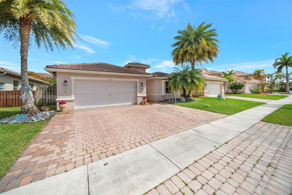 Photo of 1531 SW 194th Ter, Pembroke Pines, FL 33029 (MLS # A11984730)