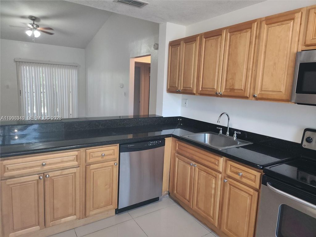 Photo of 8059 SW 21 Ct #8059, Miramar, FL 33025 (MLS # A11998340)