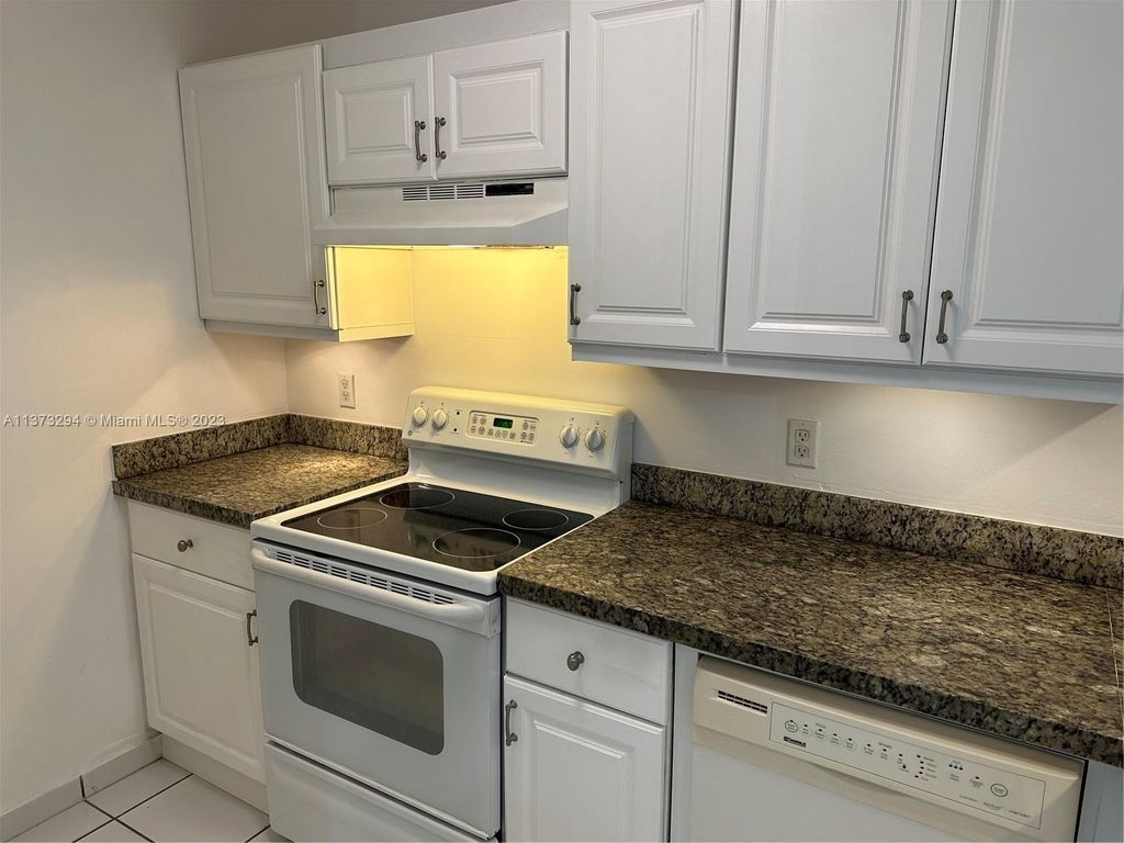 Photo of 1033 Twin Lakes Dr #27-D, Coral Springs, FL 33071 (MLS # A11373294)