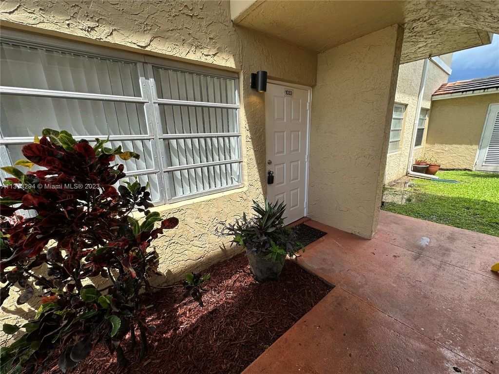 Photo of 1033 Twin Lakes Dr #27-D, Coral Springs, FL 33071 (MLS # A11373294)
