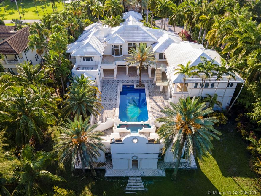 Sprawling Estate home in the private gated community of Tahiti Beach in Cocoplum.  Designed by renowned archtect, Ramon Pacheco and interior designer, Massimo Comoli, who designed Casa Casurina in South Beach. Home features 3 Stories with 14 to 30th ft ceilings throughout. Perfect home for entertaining with great room/custom bar overlooking the Italian Palazzo designed pool with protected preserve views.

Quarterly Tahiti Beach HOA dues are $7,500 and $1,500 for CocoPlum. Initial homeowners association membership fee of $135,000 required