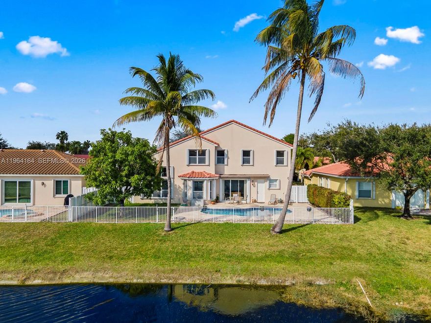 Rarely Available Spacious Lakefront Home For Sale in highly sought after Hollywood Oakridge community. 5br/3ba with Brand New Patio, Resealed and Refreshed Pool, and Hurricane Shutters overlooking the Lake. Items 1 year old or less include; Roof, Upstairs and Downstairs AC and Water Heater. The Ground Floor contains 1br/1ba, Large Porcelain Tile, Granite Countertops, High Ceilings, Utility Room with Side by Side Washer/Dryer and Sink, and a 3-Car Garage with Storage Loft. The 2nd Floor holds 4br/2ba, Office/Nursery off the Primary Bedroom, Hunter Douglas Blackout Blinds, and Excellent Closet Space. The Community Amenities include Tennis Courts, Playground, Basketball Court, and 24/7 Security and Guard Gate. Located in the heart of Hollywood, Buyers will find themselves in close proximity to 95, the Turnpike, Fort Lauderdale Airport, the Hard Rock Hotel & Casino, Shopping, Dog Parks, Playgrounds, and Houses of Worship. This home will not last long!