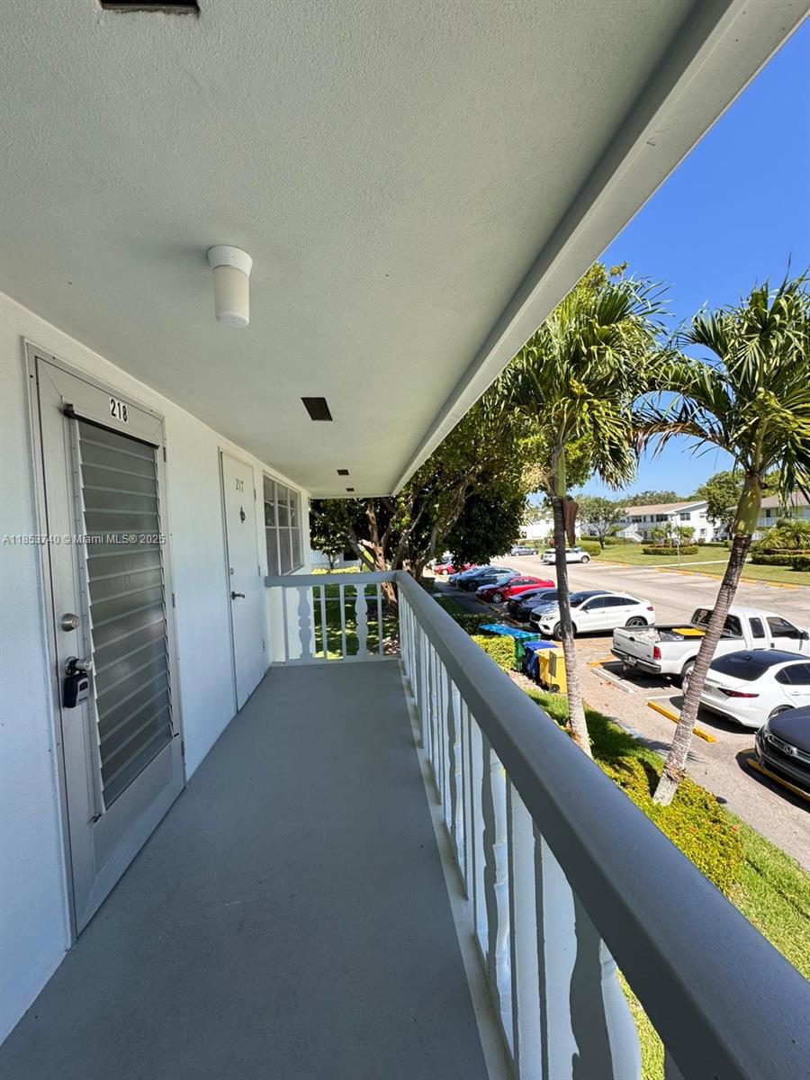 218 Windsor J in West Palm Beach is a 1-bedroom, 1-bath condo on the second floor of a 55+ gated community in Century Village. The unit features tile flooring and a screened balcony with garden views. Residents enjoy access to pools, tennis courts, a fitness center, clubhouse, theater, and a community shuttle. The community offers a secure, quiet lifestyle with a wide range of social and recreational activities for active adults. Ideal for retirees or seasonal residents seeking a low-maintenance home in a well-managed setting. No pets are allowed, and rentals are typically restricted for the first couple of years.