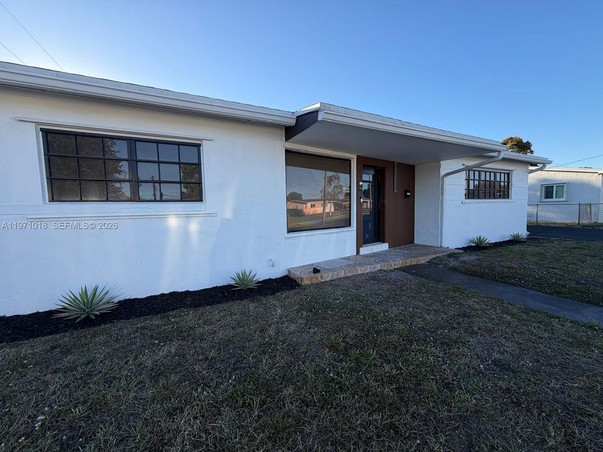 Fully renovated 4/2 home featuring elegant wood floors throughout and modern finishes. This move-in ready property offers a spacious layout and a large backyard perfect for entertaining. Located in a safe and quiet neighborhood with an epic view of Hard Rock Stadium.