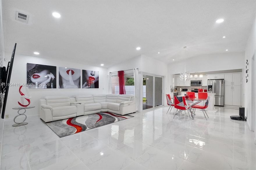 Multigenerational home offering 5 bedrooms and 4 bathrooms in a 1,871 sqft living space. Upgrades in 2022 include modern kitchen and bathrooms, plumbing, HVAC, and water heater. Roof 2021. Open-concept, spacious living area with a dining room that flows seamlessly into the kitchen. Large walk-in closets and extra linen closets. The garage has been converted into a private efficiency, perfect for extended family, guests, or rental use. Outdoor living is enhanced by a modern terrace with an aluminum awning, a contemporary 2023 in-ground pool with travertine surrounding, and a fully fenced yard offering privacy and security. EXTRA: ADU (RV) currently parked in the patio with a private entrance, capable of generating additional income. The property is conveniently located near schools and shopping centers, with easy access to the Florida Turnpike Exit 6. A rare opportunity to own a flexible, multi-use property in a prime Homestead location.