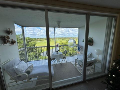 Photo of 3080 N Course Dr #704, Pompano Beach, FL 33069 (MLS # A11900706)