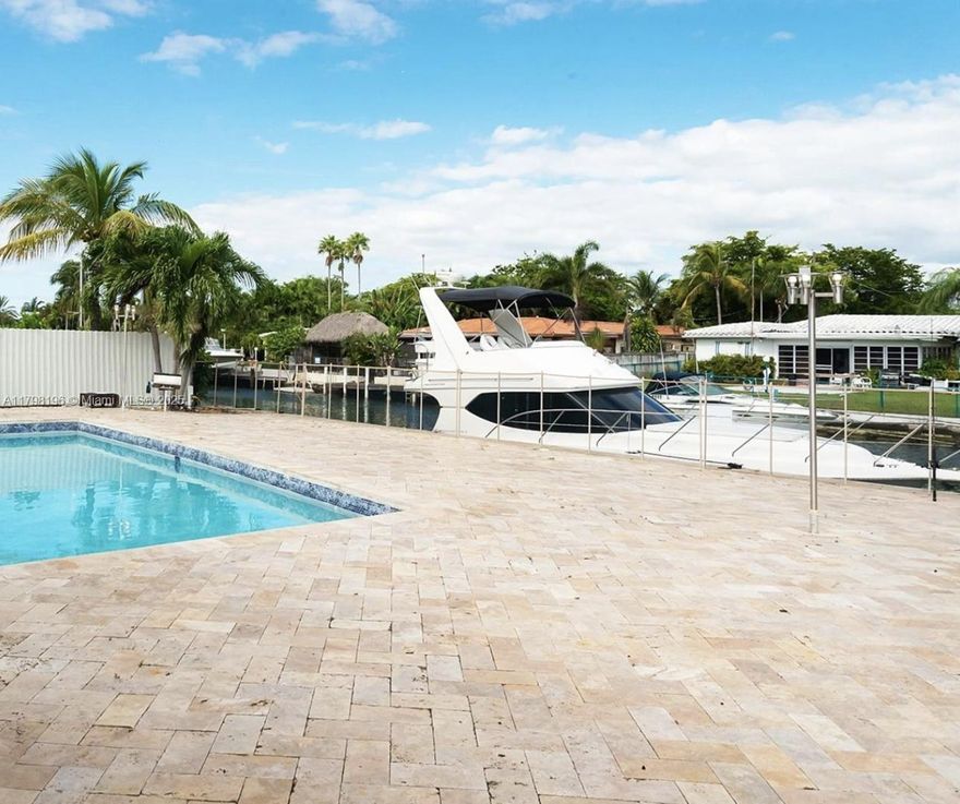 Excellent opportunity in the gated community of Keystone Islands—ideal for end-users or investors looking to renovate or hold. Property features a generous 10,125 sq ft lot with 75 feet of waterfront, direct ocean access, and no fixed bridges. Home offers solid structure with almost 4,000 sq ft of total area, spacious layout, pool, dock potential, and high ceilings in the living areas.