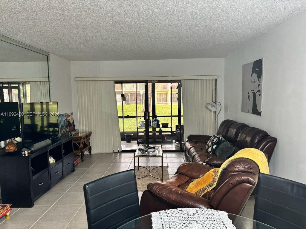 Photo of 1969 SW 15th St #93, Deerfield Beach, FL 33442 (MLS # A11992460)