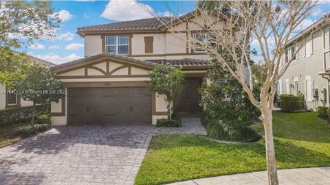 Photo of 8711 Waterside Ct, Parkland, FL 33076 (MLS # A11810174)