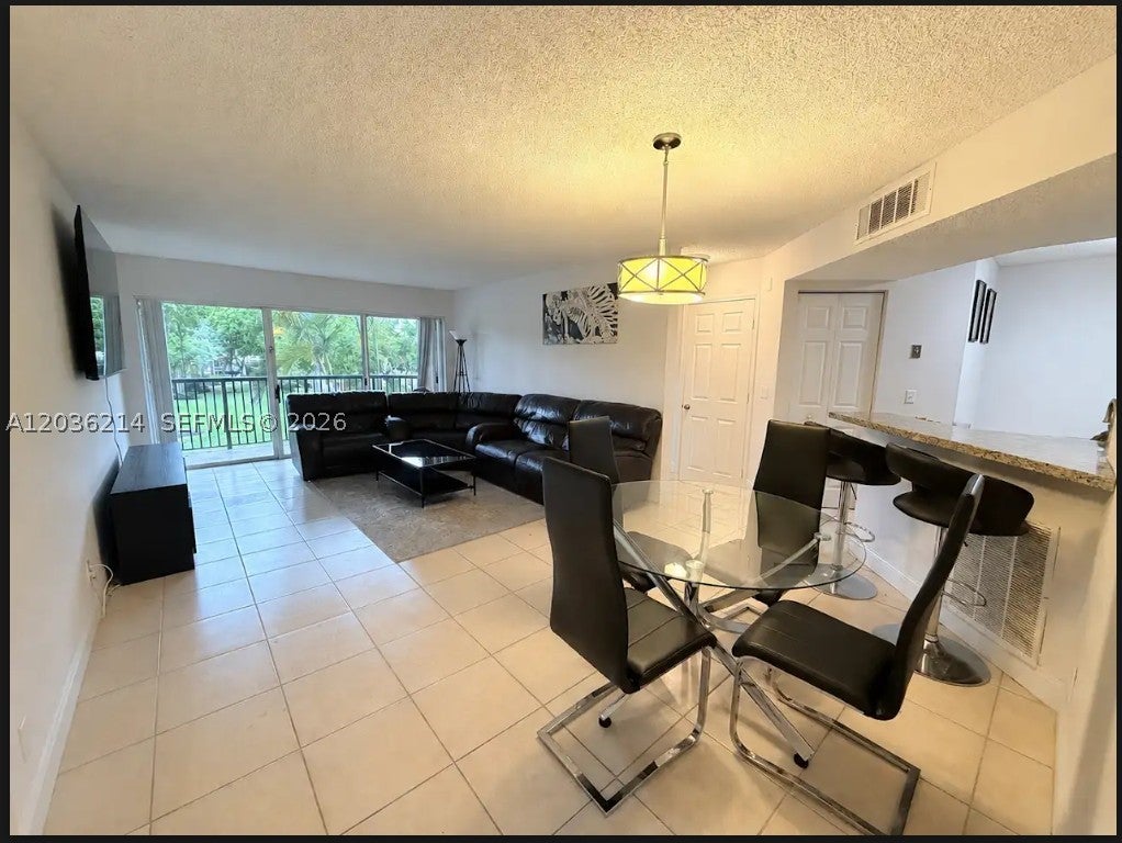 8741 Wiles Rd 204, Coral Springs FL 33067
