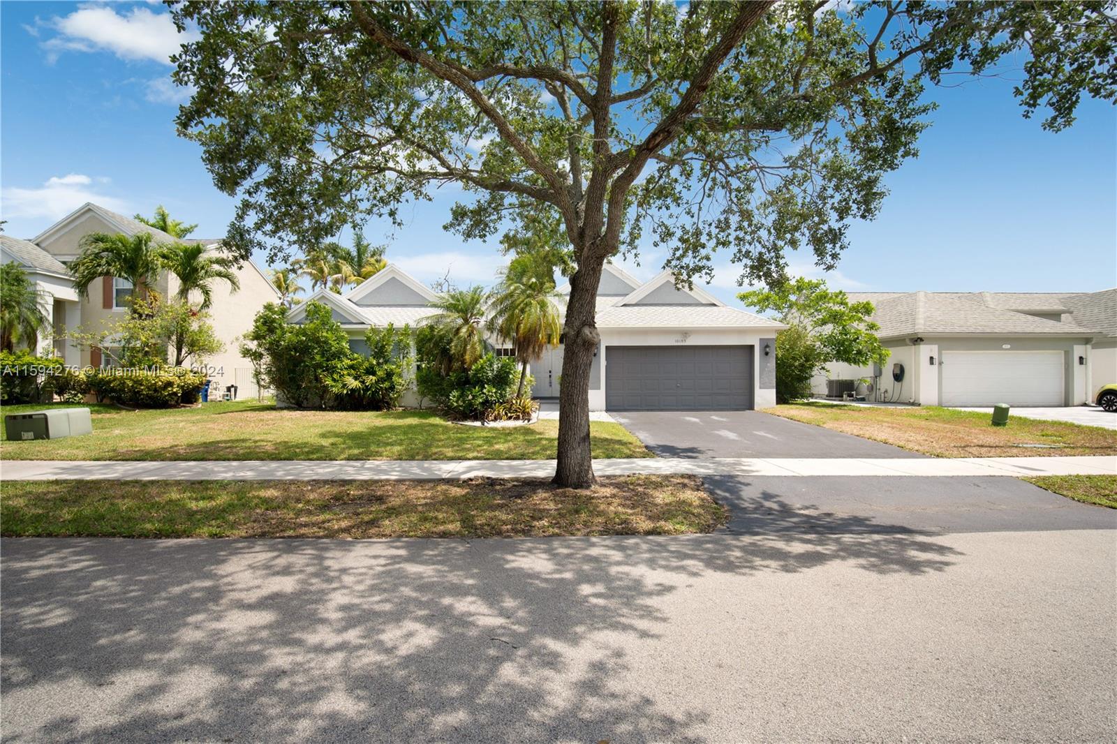 Charming Lake house in sought after Cooper Grove featuring 3 bedrooms, 2 bathrooms and a converted garage with two additional bonus room and a 3rd full bathroom. (Total of 5beds 3 baths). Vaulted ceilings, impact windows and doors, newer floors, updated kitchen, 2016 roof and room for your dream pool. Plenty of storage. Family oriented neighborhood in an A+ school district and a very low HOA.