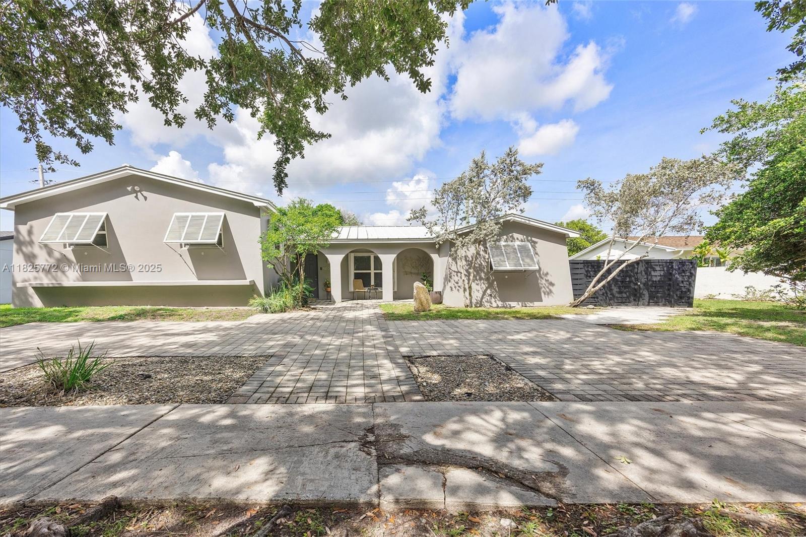 Welcome to your move-in-ready oasis in desirable Kendale South! Step inside and discover a thoughtfully updated 4-bedroom, 3-bath layout that pairs modern comfort with South-Florida resilience. A 2021 standing-seam metal roof and impact windows for decades of worry-free protection. An automatic natural gas generator that runs 1 AC, the refrigerator, range and most lights for added comfort. The light-filled kitchen flows into an open living and dining space, perfect for everyday life or game-day gatherings. Love to entertain? You’ll have abundant outdoor room for al-fresco dining, future pool plans, or a play set under the whimsical canopy trees. All this in a quiet, tree-lined pocket, moments from Killian Greens Golf Club, top-rated schools, parks, shopping, and expressways.