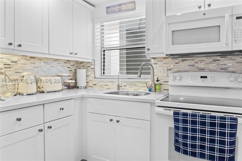 Photo of 1720 Jefferson St #407, Hollywood, FL 33020 (MLS # A12091065)
