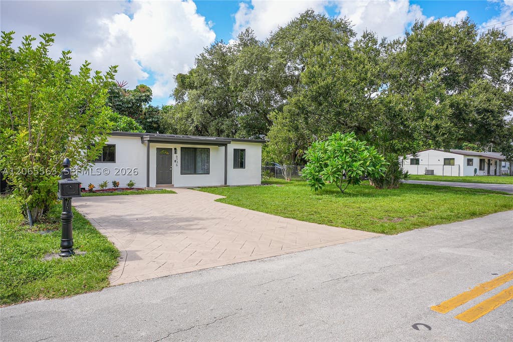 Photo of 6336 Garfield St, Hollywood, FL 33024 (MLS # A12065563)