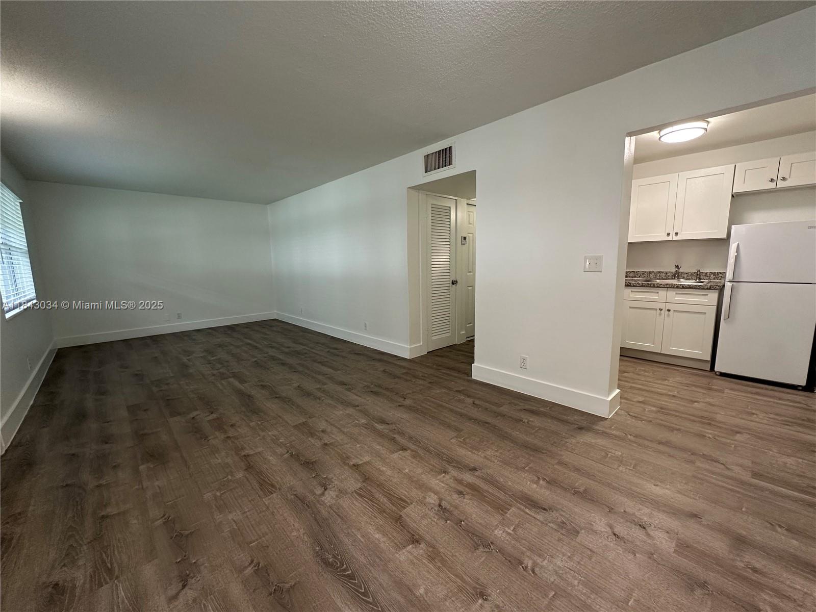 BRAND NEW, FULLY REMODELED 1BD/ 1BA APARTMENT IN A BEAUTIFUL COMPLEX IN HOLLYWOOD! Gorgeous first floor unit with plenty of natural light and multiple closets for ample storage. Unit is spacious & features new wood floors, granite countertops & bathroom upgrades. New Central A/C and impact windows. Property has a nice community courtyard / garden area - great for kids and pets. Also includes 1 assigned parking spot right in front of the unit. Laundry is onsite. Water, waste, sewer included in rent as well as pest control and maintenance. Pets welcome with small non-refundable pet fee. Centrally located, close to Downtown Hollywood, Downtown Hollywood Art Walk, Hollywood Beach Golf Club, Young Circle Park, Major highways such as A1A, US1, I-95 and more. 10 mins from Hollywood Beach!