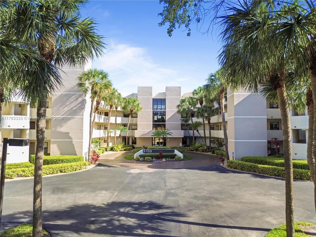 Photo of 5700 Camino Del Sol #303, Boca Raton, FL 33433 (MLS # A11783333)