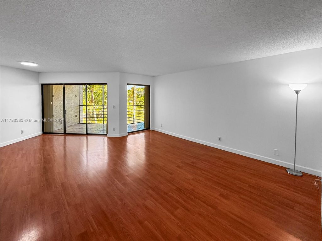 Photo of 5700 Camino Del Sol #303, Boca Raton, FL 33433 (MLS # A11783333)