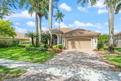 Photo of 2733 Meadowood Dr, Weston, FL 33332 (MLS # A12070933)
