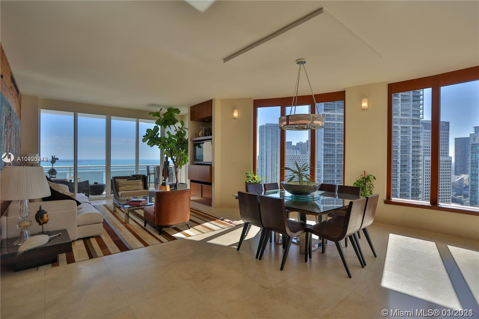 AMAZING 3 Bedroom 3.5 Bath CORNER UNIT WITH STUNNING 180 DEGREES OCEAN AND CITY VIEWS! *UNIT WAS COMPLETELY RENOVATED *Open concept kitchen with granite countertops, high ceilings, top of the line appliances, wood doors in every room, master bedroom with his and her's walk-in closets, renovated baths, great lighting, 3 balconies and a beautiful wood walls! Enjoy sunsets with views of Biscayne Bay, Miami River, & Downtown Miami Skyline. Enjoy all the great amenities the building has to offer: Swimming Pool, State of the Art Fitness Center, Sauna, Tennis Court, Racquetball Court, BBQ Area, Kids Playroom, 24 hrs concierge, security & free valet service for guests, 2 Parking Spaces. Can be sold furnished! VERY EASY TO SHOW!!!
