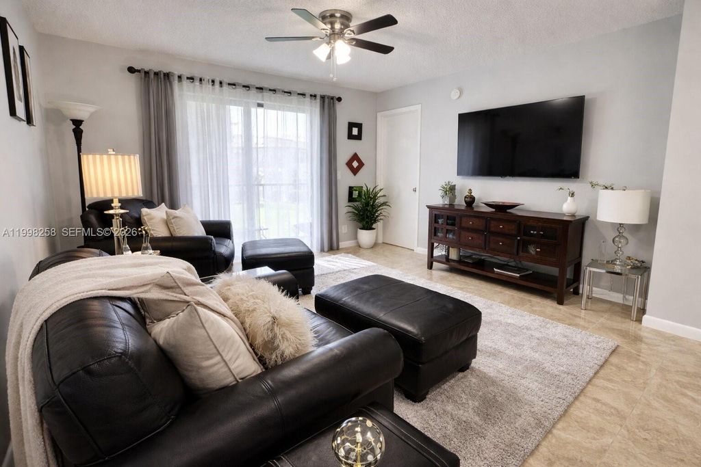 Photo of 7269 Golf Colony Ct #202, Lake Worth, FL 33467 (MLS # A11998258)