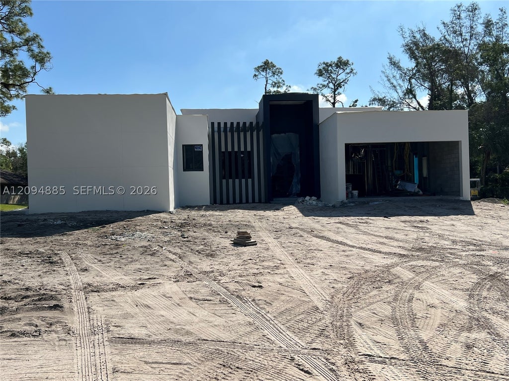 Photo of 5810 NW 66th Ave, Parkland, FL 33067 (MLS # A12094885)