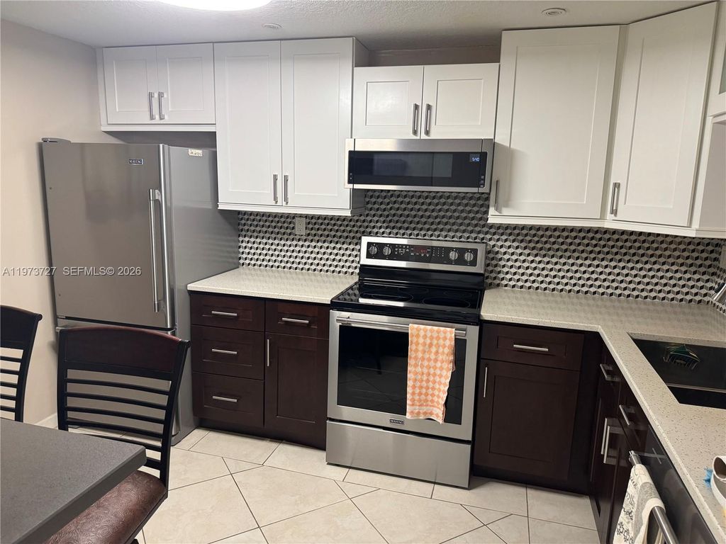 Photo of 3920 Inverrary Blvd #504C, Lauderhill, FL 33319 (MLS # A11973727)