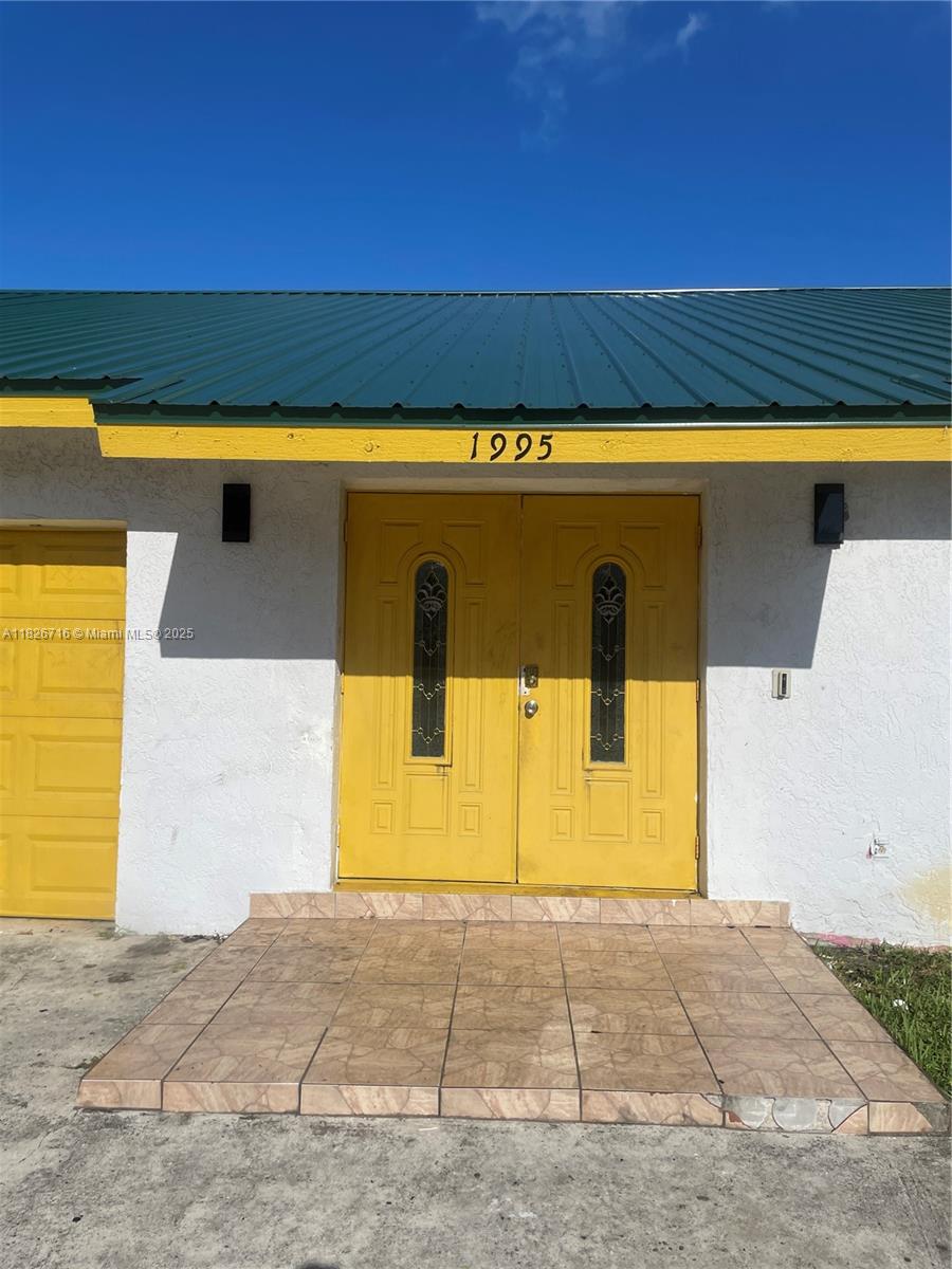 Great opportunity to own a spacious 3-bedroom, 2-bath single-family home in a quiet Boynton Beach neighborhood. This home offers a split-bedroom layout, vaulted ceilings, and a large open living area with tons of potential. The primary suite features dual walk-in closets and an en-suite bath with a soaking tub. While the property needs some TLC and updates throughout, it provides a solid foundation for a renovation project or investment. Enjoy a generous backyard space, 2-car garage, and no HOA restrictions. New metal roof. Located close to beaches, shopping, dining, and major roadways—bring your vision and your personal touches!