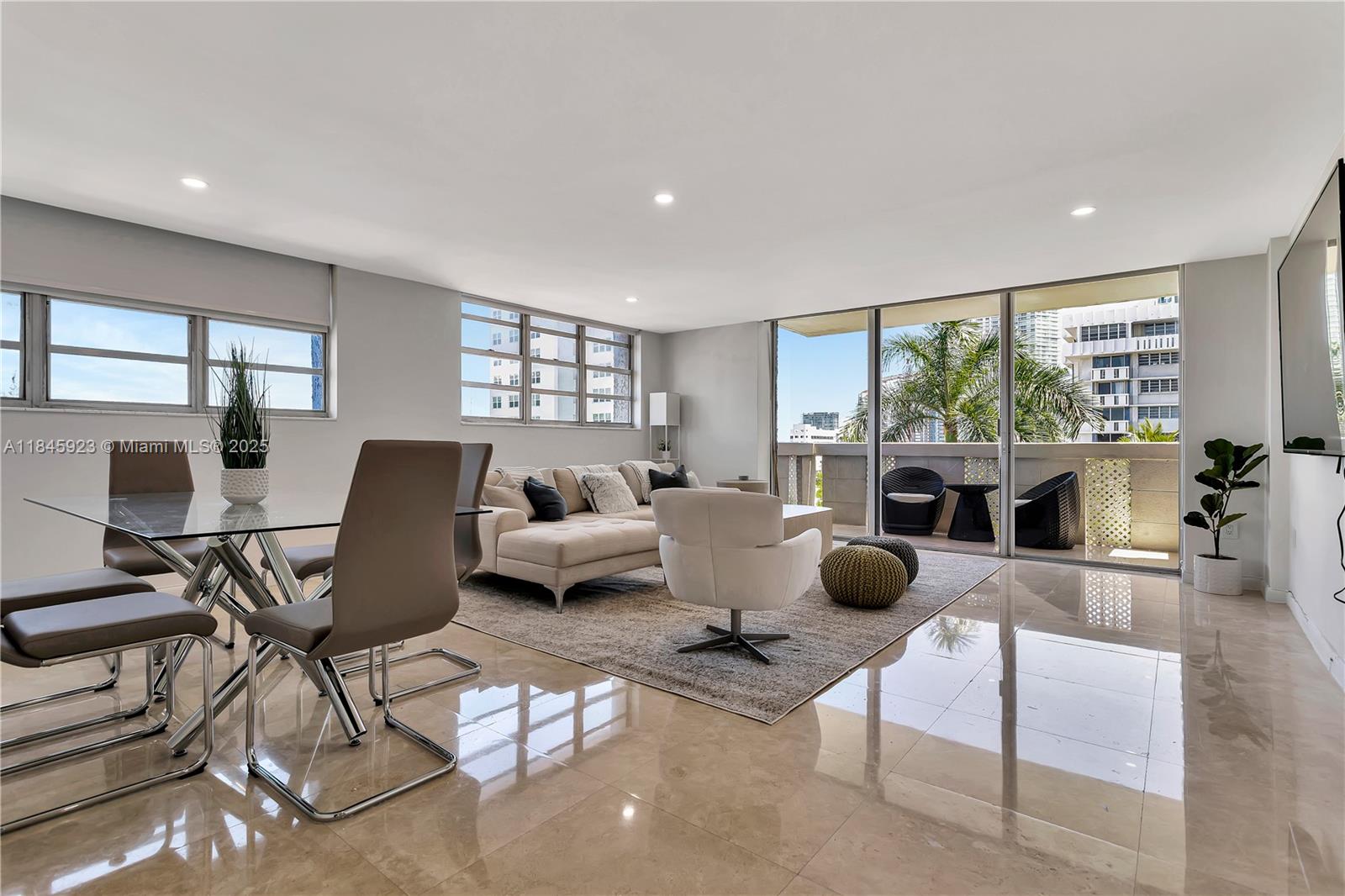 Experience luxurious living in this stunning waterfront condo, perfectly nestled in the heart of South Beach. With 2 spacious bedrooms & bathrooms, this furnished 1150 sqft offers an abundance of living space, perfect for relaxation & entertainment. The living and dining rooms are generously sized, providing an inviting & comfortable atmosphere for you & your guests to enjoy. The oversized bedrooms are a peaceful retreat, complete with ample closet and storage space. Step into the brand new kitchen, featuring white Quartz countertops, Matte finished white cabinets, & new appliances. South Bay Club's offers a resort-style pool & open-air lobby, to relax and unwind in style. The pool overlooks Biscayne Bay & Skyline of Miami. Live in one of the most coveted locations in the world.