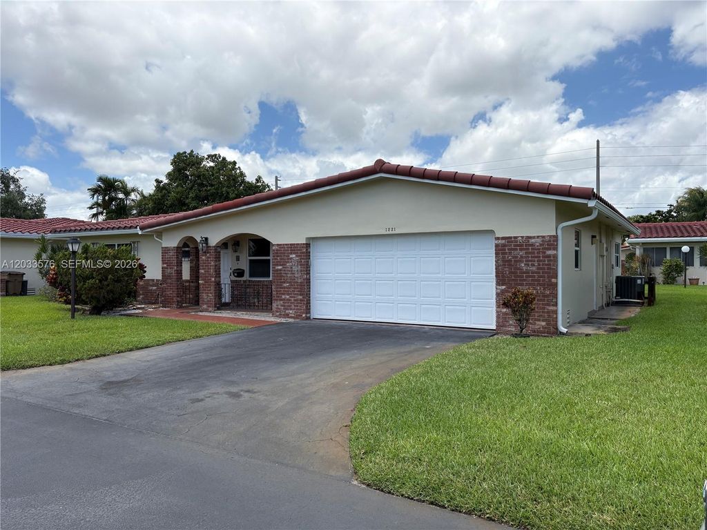 Photo of 1221 NW 44th St #., Deerfield Beach, FL 33064 (MLS # A12033576)