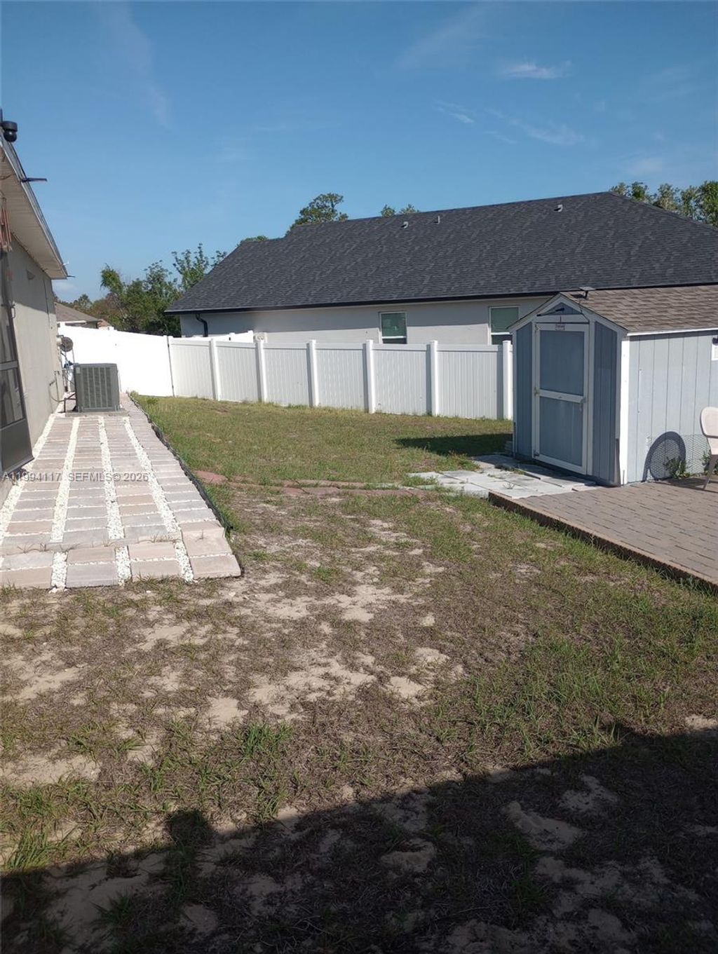 Photo of 1017 Fraser Place, Other, FL 34759 (MLS # A11994117)