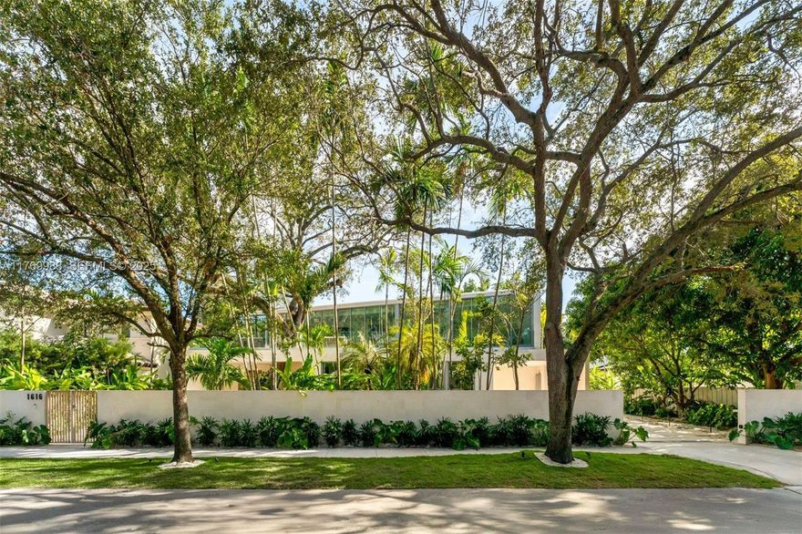 Set on an exceptionally large 11,544 sq ft lot — a rare find in North Coconut Grove — this brand-new residence designed by architect Simon Bissu and developed by Luxom Developments redefines modern luxury. Spanning 6,194 sq ft with 8 bedrooms, 8 bathrooms, and a powder room, the home showcases exquisite finishes including natural limestone, marble, warm wood tones, and top-tier appliances and fixtures. Nestled amid mature tropical landscaping, the property offers a true sense of privacy and serenity, ideal for both everyday living and entertaining. A unique opportunity to own a newly built estate on one of the Grove’s most coveted and spacious parcels.