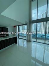 Near everywhere you want to be. 1 Bed 1/1.5 Bath One of a kind 2-story townhouse with views to the Miami River. Largest one bedroom unit in Epic. White porcelain flooring, 8 foot ceiling height, 2 balconies, spectacular bathtub + rain shower. Amenities include pool, 2 restaurants, fitness center, bar, lounge, salon, sauna, play area, 24-hr concierge, valet, and much more. A few blocks away from Downtown, Bayside, Brickell, fine dining, night life and more. Don't miss this opportunity.