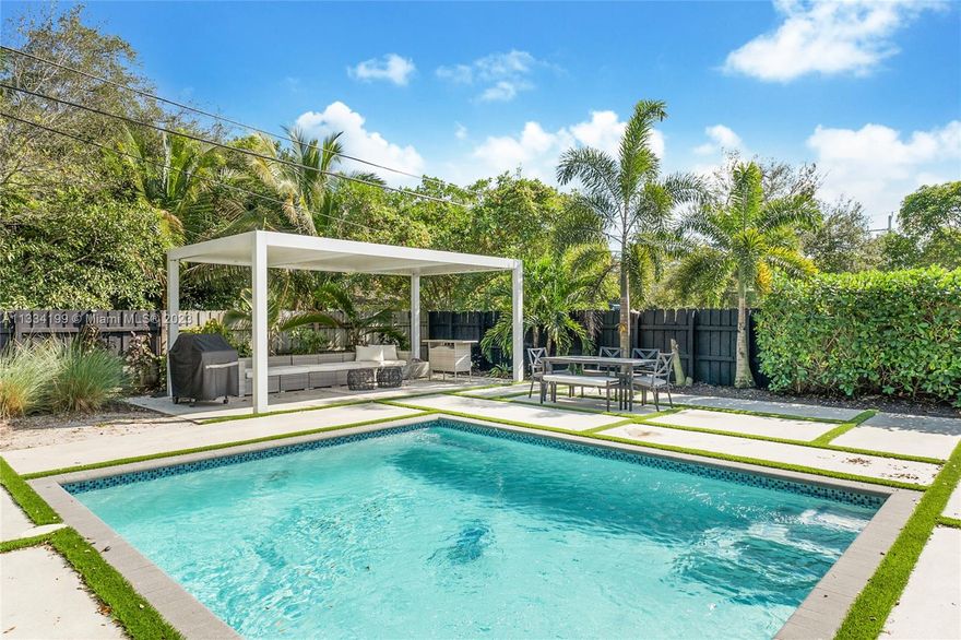 West Buena Vista is located only blocks to shopping, restaurants, and more from the famous Design District and Upper Buena Vista. No need for expensive and time-consuming renovations, this home was completed in late 2019. Ideal for entertaining, the courtyard with a freshwater pool becomes a part of the interior living space. The home features 9+ foot ceilings, continuous 36” x 36” porcelain tiles throughout, bathrooms with beautiful wall tiles and rainfall shower heads, large windows overlooking the huge courtyard, completely fenced with an automated electric gate to the driveway, and a Vint smart home system with exterior cameras and motion sensors. The continuous development of the Buena Vista area, next to the Design District, makes this house a great opportunity for you.