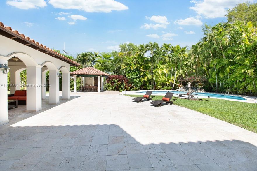 Magnificent 7 bedroom, 7.2 bathroom estate located on the distinguished Coral Way’s oak-lined streetscape near Miracle Mile, golf courses and the esteemed Biltmore Hotel. This timeless residence sitting on an oversized 26,250 sf lot, features an office/library, gym, and sauna. Natural light beams through the elegant living spaces and formal dining room. Lush tropical landscaping enhances the oversized lot, along with a spacious covered terrace, summer kitchen and gazebo, and a glistening oversized pool.