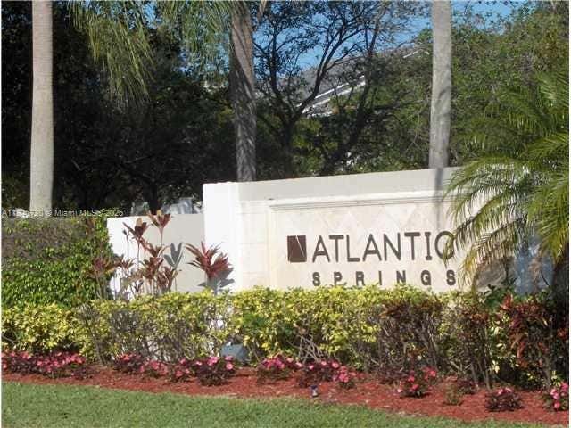 Photo of 11211 W Atlantic Bl #302, Coral Springs, FL 33071 (MLS # A11846730)