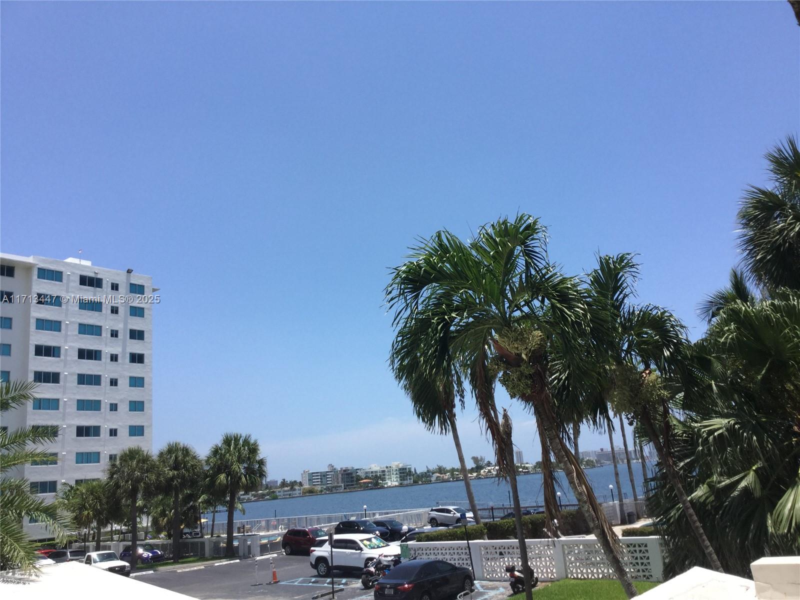 Delightful spacious 2/2 with PRIVATE BALCONY, overlooking the bay in very popular Treasures on the Bay. Very private location...no traffic noise. Hurricane impact windows and doors. Granite kitchen with stainless steel appliances and wood cabinets. Split floor plan with huge patio and plenty of closets. There's plenty to do with 3 beautiful pools, state of the art gym. We even have our own convenience store. Free trolley to Miami Beach just 2 blocks away. You will be impressed!. Walls have all been painted white. Building undergoing painting and concrete repairs.
