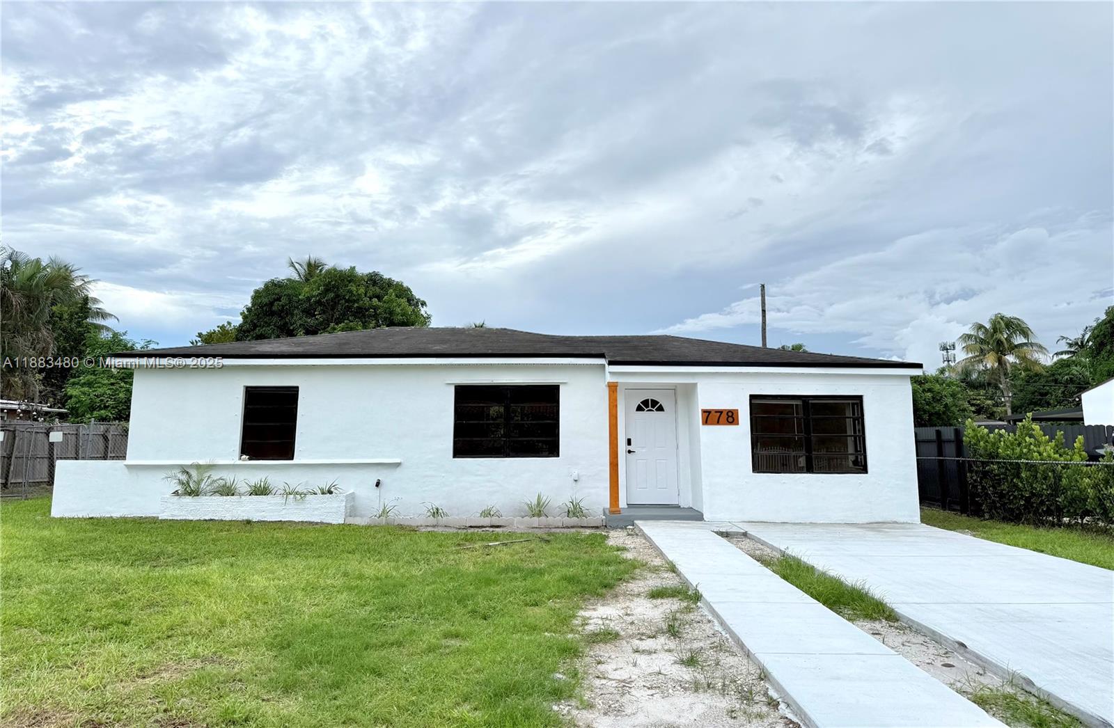 Beautiful 3-bedroom, 2-bathroom single-family home in Biscayne Gardens featuring updated vinyl flooring throughout and a modern kitchen with center island, ideal for gatherings. Bright open living spaces and a spacious backyard with room for a pool offer plenty of potential for outdoor living. Conveniently located near highways, schools, and shopping.