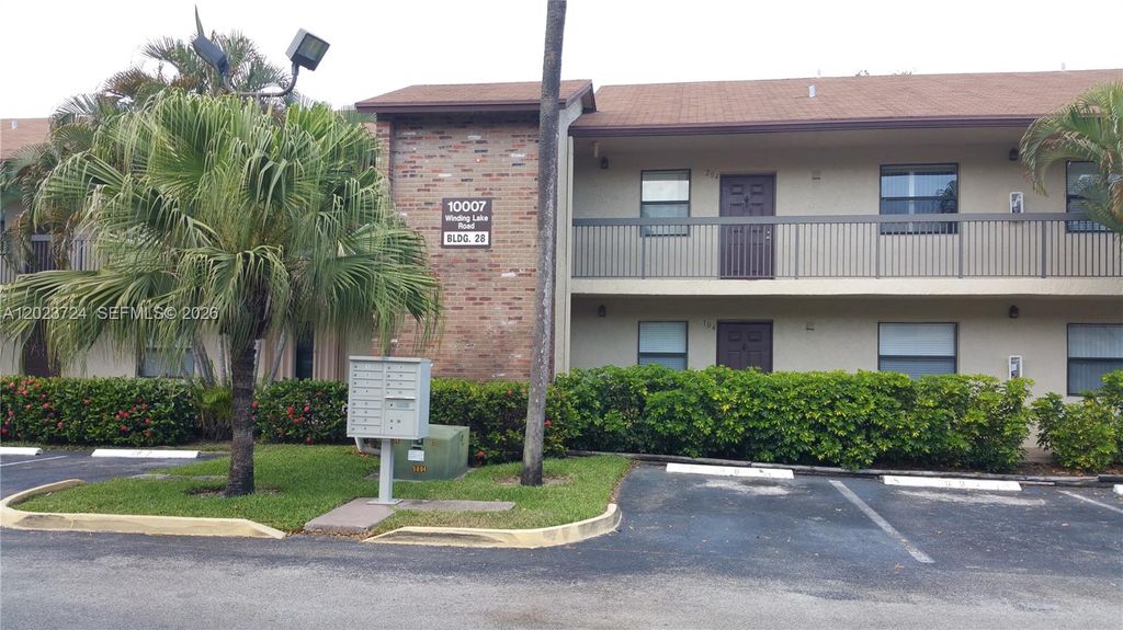 Photo of 10005 Winding Lake Rd #204, Sunrise, FL 33351 (MLS # A12023724)