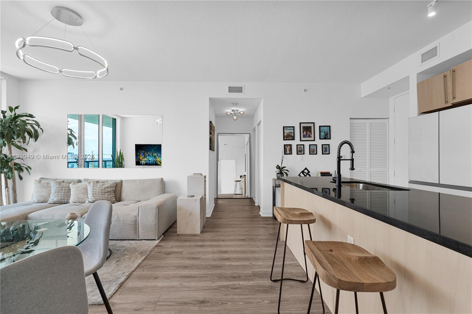 Unobstructed city views in a Spacious, perfectly split 2 bedroom with NEW modern appliances in the heart of Brickell. Large balcony with high quality turf with direct access from EVERY room. Glass enclosed showers, custom lighting fixtures, black out shades, and laminate floors throughout. Luxury building amenities include; 2 pools (lap & resort-style), fitness center, yoga room, hot tub, doorman and concierge, valet parking, kids room, recreational room with billiards and ping pong table plus a bbq area. Steps away from Publix, Mary Brickell Village, Brickell City Centre, and the metromover, which gets you around the city for free with stops at the Kaseya Arena and the Brightline. True city living in the heart of Miami's financial district.