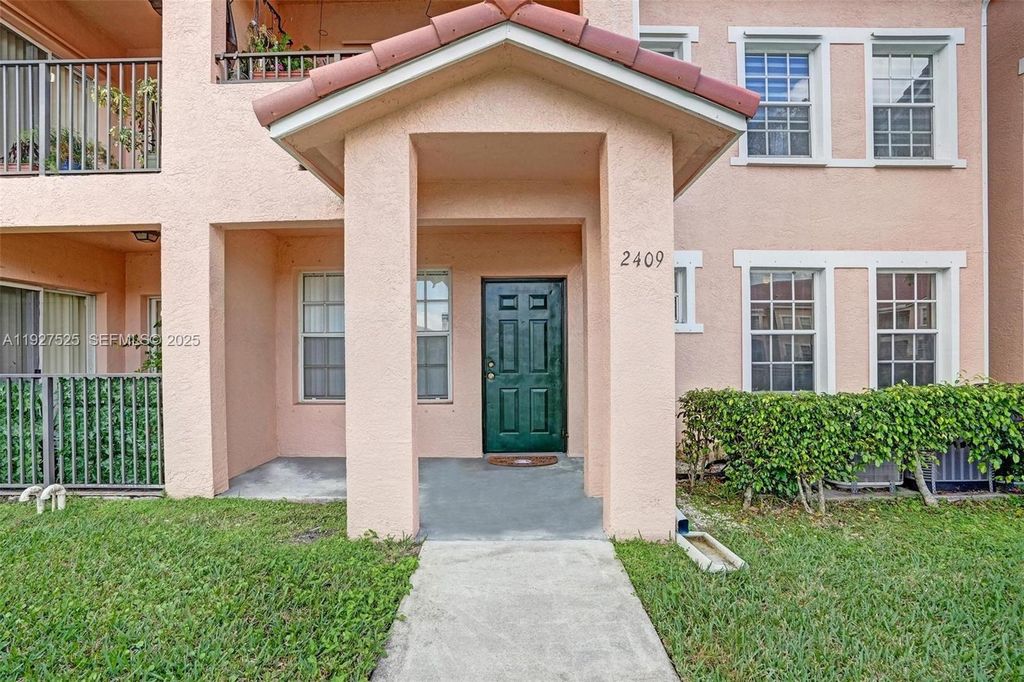 Photo of 2409 Belmont Ln #2409, North Lauderdale, FL 33068 (MLS # A11927525)