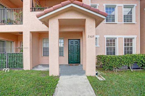 Photo of 2409 Belmont Ln #2409, North Lauderdale, FL 33068 (MLS # A11927525)