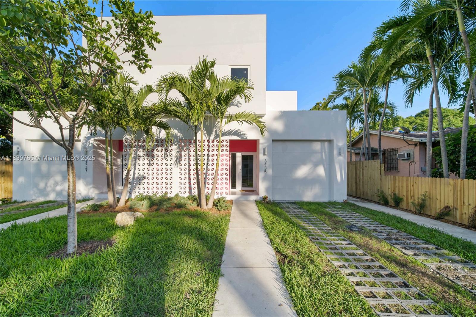 Truly one-of-a-kind modern residence located in the vibrant and rapidly growing neighborhood of Allapattah! This stunning 5-bedroom, 3-bath home offers a spacious layout with high ceilings, wood-look porcelain floors, impact windows and doors, and an attached one-car garage. Enjoy an open-concept living space and a gourmet chef’s kitchen perfect for entertaining. Upstairs, you’ll find four generously sized bedrooms including a primary suite with a walk-in closet. A fifth bedroom with a full bath is conveniently located on the first floor—ideal for guests or a home office. Unbeatable location! Just minutes from the Miami Design District, Midtown, and Wynwood—offering easy access to world-class dining, shopping, and entertainment. A perfect place to call home!