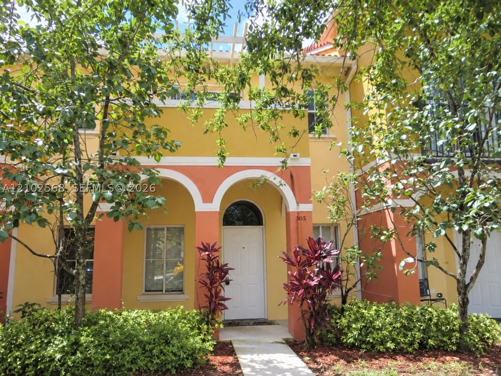Photo of 305 S Santa Catalina Cir, North Lauderdale, FL 33068 (MLS # A12102568)
