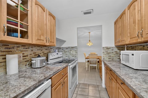 Photo of 867 North Dr #B, Delray Beach, FL 33445 (MLS # A12074801)