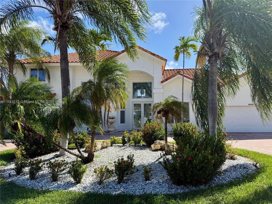 STUNNING 4-BEDROOM, 4-BATH WATERFRONT HOME featuring MODERN BATHROOMS and KITCHEN! PORCELAIN FLOORS throughout the main areas with WARM HARDWOOD FLOORS in the bedrooms. Enjoy your PRIVATE POOL and SPACIOUS PATIO with WATER VIEWS and DIRECT INTRACOASTAL ACCESS—perfect for FAMILY and ENTERTAINING. MOVE-IN READY in a DESIRABLE NEIGHBORHOOD close to TOP SCHOOLS, DINING, and BEACHES. Don’t miss this RARE OPPORTUNITY to own a DREAM WATERFRONT HOME!