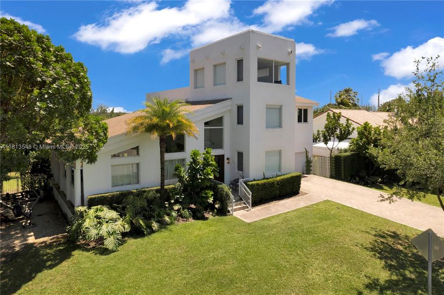 Casa Delfin is a move-in ready dream home, currently configured as a 5-bedroom, 5-bath residence 
Features elegant terrazzo and marble flooring, while the second floor and third-level studio/lounge boast rich, real wood floors. Two spacious roof decks offer stunning views of both the north marina and south green landscape.
Built in 1996 and engineered to withstand hurricanes, the home blends durability with luxury. The chef’s kitchen features Cristallo quartzite countertops, a Wolf induction stove, Sub-Zero refrigerator, and its own cozy lounge area with a custom-built dining nook. Additional highlights include updated bathrooms, a large backyard with a pool and  includes access to the marina and 8 deeded docks.
Located in a private, gated community with its own park.