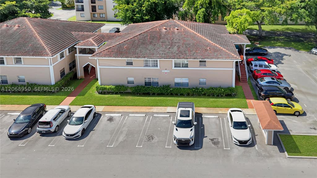 Photo of 10168 Twin Lakes Dr #13-A, Coral Springs, FL 33071 (MLS # A12068950)