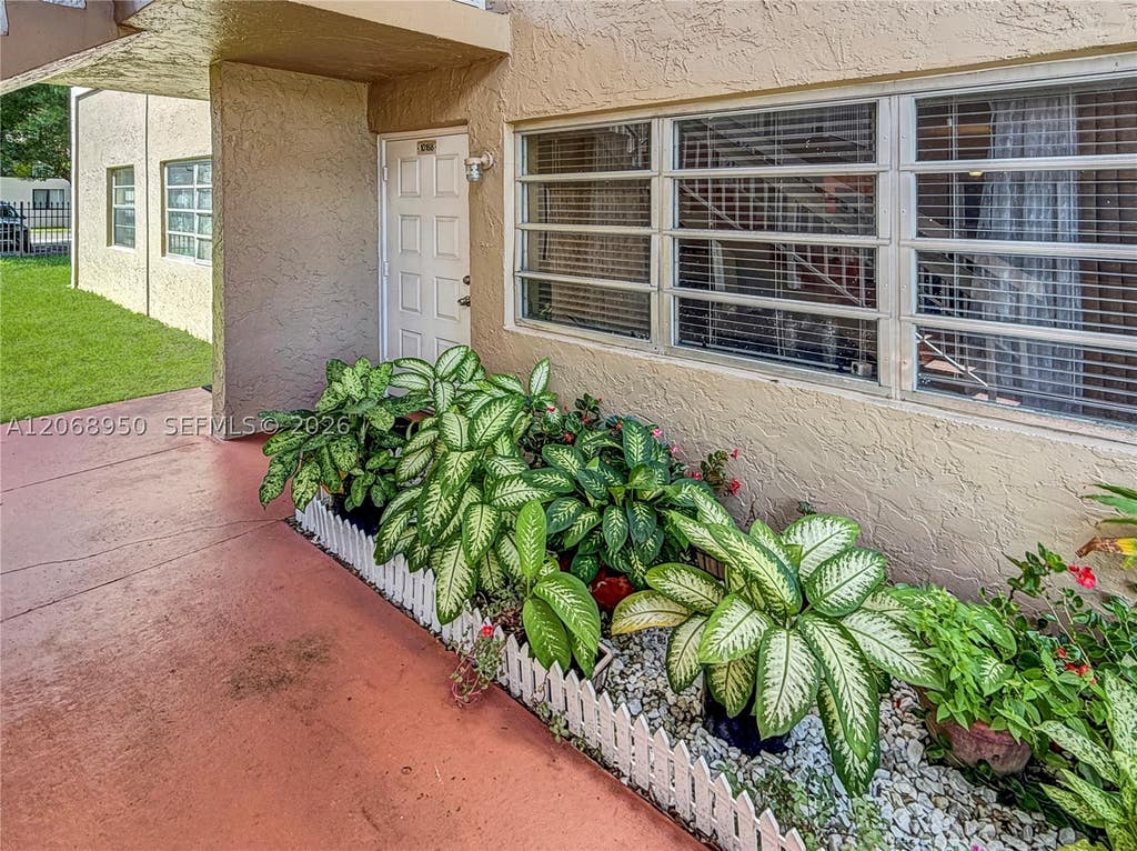 Photo of 10168 Twin Lakes Dr #13-A, Coral Springs, FL 33071 (MLS # A12068950)